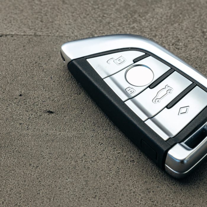 modern-automobile-car-key-on-black-concrete-backgr-2025-02-25-07-01-48-utc (1) (1)